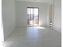 Bright dining room with sliding glass doors to patio at 846 N Pueblo Dr # 138, Casa Grande, AZ 85122