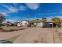 Charming single-story home with a well-maintained front yard at 2518 E Campbell Ave, Phoenix, AZ 85016