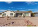 Charming single-story home with a well-maintained front yard at 2518 E Campbell Ave, Phoenix, AZ 85016