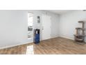 Entryway with wood-look floors and a cat tree at 2132 W Glenrosa Ave # 81D, Phoenix, AZ 85015