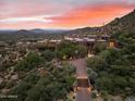Hilltop home with a long driveway and mountain views at 11155 E Honda Bow Rd, Scottsdale, AZ 85262