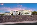 Spanish style home with desert landscaping at 18610 W Porter Dr # 93, Goodyear, AZ 85338