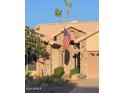 House exterior with stone accents and American flag at 851 N Pineview Dr, Chandler, AZ 85226