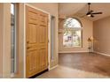 Bright and airy entryway with tiled floors and a view into the living area at 851 N Pineview Dr, Chandler, AZ 85226