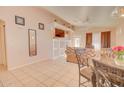 Bright living room with tile floors and built-in shelving at 507 W Casa Mirage Ct, Casa Grande, AZ 85122