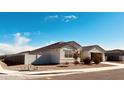 Well-maintained home with a two-car garage and a fenced yard at 18195 N San Juan St, Maricopa, AZ 85138