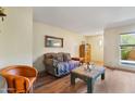 Living room with southwestern decor and hardwood floors at 1425 E Desert Cove Ave # 49, Phoenix, AZ 85020