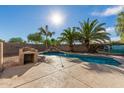 Inviting sparkling pool with a rock waterfall feature at 28614 N Sunset Dr, San Tan Valley, AZ 85143