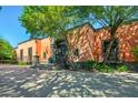 Spanish-style home with large wooden doors and lush landscaping at 8100 N 68Th St, Paradise Valley, AZ 85253