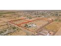 Aerial view of property showing lot lines and surrounding area at 50910 W Long Rifle Rd, Aguila, AZ 85320