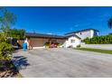 Newly remodeled home with artificial turf and updated garage at 4002 E Clarendon Ave, Phoenix, AZ 85018