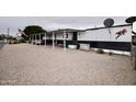 View of the mobile home from the street side at 602 S 93Rd Pl, Mesa, AZ 85208