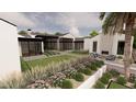 Luxury home with expansive backyard, featuring a grassy area and lush landscaping at 5704 N Wilkinson Rd, Paradise Valley, AZ 85253