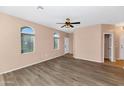 Living room with wood-look floors and neutral walls at 17365 N Cave Creek Rd # 116, Phoenix, AZ 85032