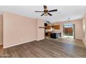 Open kitchen with island, stainless steel appliances and access to backyard at 17365 N Cave Creek Rd # 116, Phoenix, AZ 85032