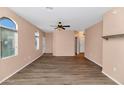 Bright living room featuring wood-look flooring and neutral walls at 17365 N Cave Creek Rd # 116, Phoenix, AZ 85032