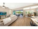Spacious living area with access to backyard and pool at 20594 W Pasadena Ave, Buckeye, AZ 85396