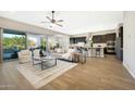 Open concept living area with kitchen and dining views at 20594 W Pasadena Ave, Buckeye, AZ 85396