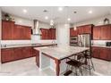 Gourmet kitchen boasts granite countertops and rich wood cabinetry at 4526 E Vista Bonita Dr, Phoenix, AZ 85050