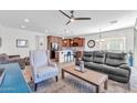 Open concept living room with kitchen and seating area visible at 36106 N Desert Tea Dr, San Tan Valley, AZ 85140