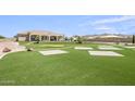 Artificial turf, putting green, and expansive backyard at 25824 S 194Th St, Queen Creek, AZ 85142