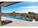 Luxury pool with expansive mountain views and spacious patio at 9989 E Aleka Way # 337, Scottsdale, AZ 85262