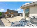 Spacious rooftop deck boasts comfortable seating and city views at 1501 N Miller Rd # 1002, Scottsdale, AZ 85257