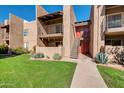 Condo building exterior showing two units and walkway at 5525 E Thomas Rd # F9, Phoenix, AZ 85018