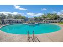 Community pool with a spa and plenty of lounge chairs for relaxation at 280 S Evergreen Rd # 1261, Tempe, AZ 85288