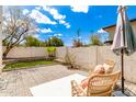 Relaxing patio with brick pavers and comfortable wicker seating at 8611 S 48Th St # 3, Phoenix, AZ 85044