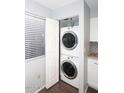 Stackable washer and dryer in a convenient laundry closet at 9450 N 95Th St # 118, Scottsdale, AZ 85258