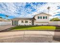 Beautiful home with modern design and a well-manicured lawn at 8107 E San Miguel Ave, Scottsdale, AZ 85250