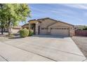 Two-story house with a two-car garage and mature landscaping at 3291 E Latham Way, Gilbert, AZ 85297