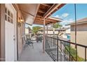 Private balcony with seating, overlooking the community at 8534 E Portland St, Scottsdale, AZ 85257