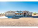 New single-story home with attached two-car garage at 15435 W Bajada Dr, Surprise, AZ 85387
