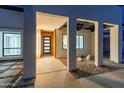 Light and airy entryway with modern design and stone accents at 5632 E Emile Zola Ave, Scottsdale, AZ 85254