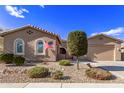 Single-story home with landscaping and a two-car garage at 23680 N 168Th Ln, Surprise, AZ 85387