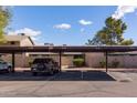 Carport parking area with assigned parking spots at 4632 W Continental Dr, Glendale, AZ 85308