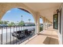 Exterior balcony view overlooking parking lot and other condo units at 3270 S Goldfield Rd # 315, Apache Junction, AZ 85119