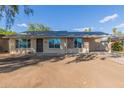 Single story home with front yard and driveway at 638 E Hampton Ave, Mesa, AZ 85204