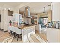 Large kitchen with granite countertops and high-end appliances at 2549 W Shinnecock Way, Anthem, AZ 85086