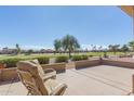 Relaxing patio overlooking a golf course at 14113 W Via Montoya Dr, Sun City West, AZ 85375