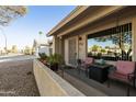 Inviting front porch with seating area, perfect for relaxing outdoors at 739 S 80Th St, Mesa, AZ 85208