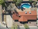 Aerial view of single story home with pool and surrounding landscape at 1009 E Shadow Ridge Rd # 1, Casa Grande, AZ 85122