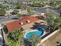 Aerial view showing single-story home, pool, and surrounding neighborhood at 1009 E Shadow Ridge Rd # 1, Casa Grande, AZ 85122