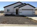 New construction home with two-car garage at 8467 W Tinajas Dr, Arizona City, AZ 85123