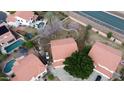 Aerial view showing house, backyard, and surrounding neighborhood at 5702 W Windrose Dr, Glendale, AZ 85304