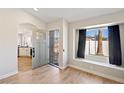 Bright and airy entryway with view into the kitchen at 6617 E Northridge St, Mesa, AZ 85215