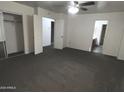 Spacious bedroom with ample closet space and carpet flooring at 12001 W Yuma St, Avondale, AZ 85323