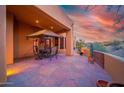 Spacious flagstone patio with seating area and sunset views at 1547 Calle Encantada --, Wickenburg, AZ 85390